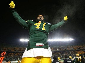 Edmonton Eskimos Odell Willis celebrates a CFL playoff win over the Saskatchewan Roughriders at Commonwealth Stadium in Edmonton, AB o November 16, 2014.