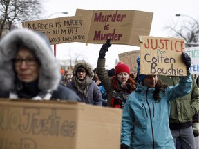 People march during a rally in response to Gerald Stanley's acquittal in the shooting death of Colton Boushie in Edmonton, Alta., on Saturday, February 10, 2018.