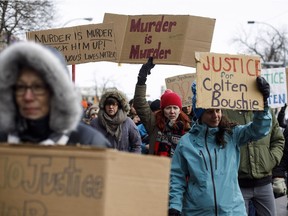 People march during a rally in response to Gerald Stanley's acquittal in the shooting death of Colten Boushie in Edmonton, Alta., on Saturday, February 10, 2018.