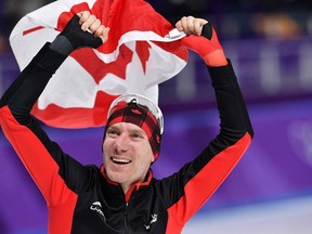 Canada's Ted-Jan Bloemen celebrates winning the gold medal in the men's 10,000m speed skating event during the Pyeongchang 2018 Winter Olympic Games at the Gangneung Oval in Gangneung on February 15, 2018.