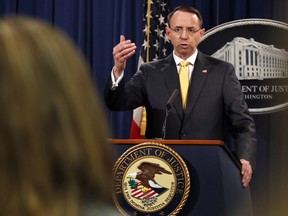 Deputy Attorney General Rod Rosenstein answers a question after announcing that the office of special counsel Robert Mueller announced a grand jury has charged 13 Russian nationals and several Russian entities, Friday, Feb. 16, 2018, in Washington. The defendants with an elaborate plot to interfere in the 2016 U.S. presidential election.