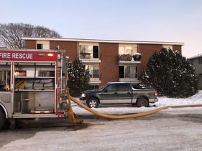 Fire broke out inside a basement suite of a west Edmonton apartment building near 100 Avenue and 155 Street on Friday, Feb. 9, 2018.