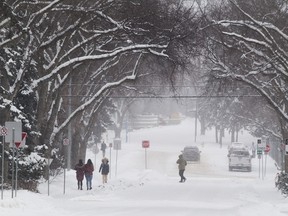 Pedestrians were bundled up to stay warm at the University of Alberta on Friday, Feb. 2, 2018 in Edmonton. The forecast calls for more snow and cold, with a low of -27C. Greg  Southam / Postmedia