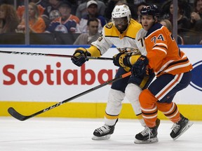 The Edmonton Oilers' Ethan Bear (74) battles the Nashville Predators' P.K. Subban (76) during first period NHL action at Rogers Place in Edmonton Thursday March 1, 2018. Photo by David Bloom