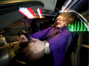 Frank Florian, director of planetarium and space sciences at the Telus World of Science has fun in the the DeLorean time machine from the movie Back to the Future, on display as part of the science centre's POPnology exhibit in Edmonton on Friday, March 2, 2018.