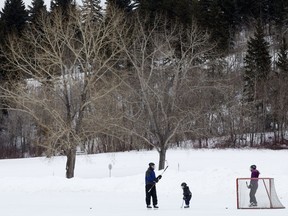 Hockey players skate in Hawrelak Park, in Edmonton Friday March 2, 2018.