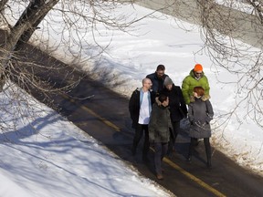 Architect David James,  intern architect Izak Bridgman, marketing and tourism specialist Gillian Thomson, architect Michael Rivest,  intern architect Michael Zabinski and landscape architect Kevin Dieterman walk along the High Level Line, west of 109 Street near 99 Avenue, in Edmonton on Monday March 5, 2018. The group of young professionals is pitching ideas for the High Level Line, a linear park stretching from MacEwan University to Whyte Avenue.