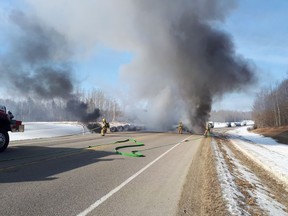 At 10:56 a.m., RCMP were dispatched along with other emergency services to a rollover involving a truck hauling lumber. The truck was fully engulfed in flames.