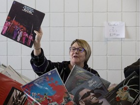 Hundreds of vinyl fans search through the 50,000 records on display during the Dead Vinyl Society's Super Mega Records Garage Sale at Kenilworth Community Hall, 7104 87 Ave., in Edmonton on Friday, March 30, 2018.