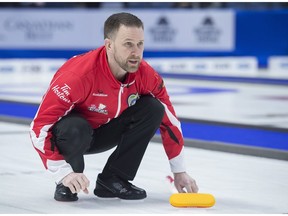 Team Canada skip Brad Gushue watches a rock as they play Alberta in the Tim Hortons Brier championship game at the Brandt Centre in Regina on Sunday, March 11, 2018. THE CANADIAN PRESS/Andrew Vaughan