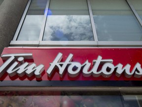 A Tim Hortons coffee shop in downtown Toronto on June 29, 2016. Tim Hortons plans to renovate most of its Canadian restaurants over the next several years in what some franchisees say is another "ill-conceived" move that will leave individual restaurant owners on the hook for about $450,000.