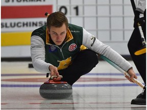 Skip Karsten Sturmay throwing his rock against Team Sluchinski during draw 2 of the 2018 Boston Pizza Cup Alberta Men's Curling Championship at Grant Fuhr Arena in Spruce Grove, January 31, 2018.