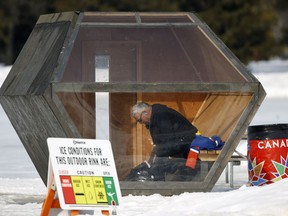 Don Carmichael takes off his skates in the outdoor skating rink shack at Hawrelak Park in Edmonton on Thursday March 15, 2018.
