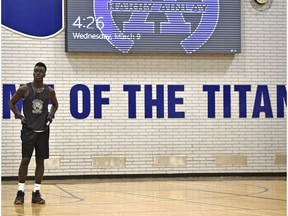 Aher Uguak, seen here in this 2016 file photo from his Grade 12 year with the Harry Ainlay Titans, is redshirting with the University of Loyola-Chicago Ramblers.