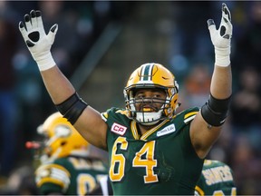 Edmonton Eskimos offfensive lineman Andrew Jones celebrates a touchdown during first half CFL West Division final football action against the Calgary Stampeders in Edmonton, Sunday, Nov. 22, 2015.