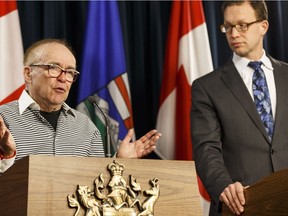 In happier times: a news conference in 2016 where Marlin Schmidt, right, named Michael Phair the chair of the University of Alberta board of governors.