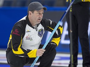 New Brunswick skip James Grattan watches a rock during the Tim Hortons Brier at the Brandt Centre in Regina on Monday, March 5, 2018. (THE CANADIAN PRESS/Andrew Vaughan)