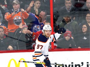 Edmonton Oilers centre Connor McDavid (97) celebrates his goal against the Ottawa Senators during second period NHL hockey in Ottawa on Thursday, March 22, 2018.