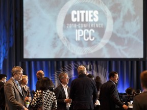 Delegates chat on the floor of the CitiesIPCC Cities and Climate Change Science conference at the Shaw Conference Centre in Edmonton, Alberta on Monday, March 5, 2018.