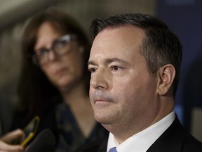 United Conservative Party leader Jason Kenney responds to the Speech from the Throne during a media scrum at the Alberta Legislature in Edmonton, Alberta on Thursday, March 8, 2018. Photo by Ian Kucerak/Postmedia