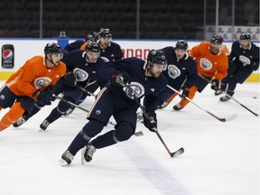 Edmonton Oilers players skate during practice at Rogers Place in Edmonton on March 28, 2018.