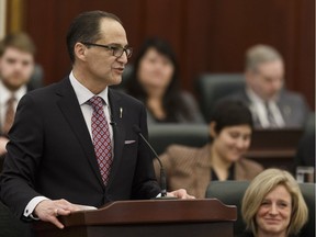 Alberta Finance Minister Joe Ceci (left) speaks alongside Premier Rachel Notley (right) as he tables Budget 2017 in the Alberta Legislature in Edmonton on Thursday, March 16, 2017. File photo.