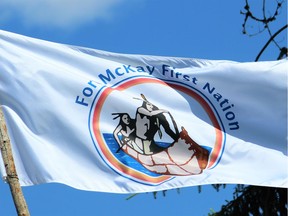 A flag for the Fort McKay First Nation flies over the indigenous community north of Fort McMurray, Alta. File photo.