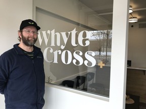 Paul Olson, owner of Whyte Cross, a dispensary on Whyte Avenue, says he will fight charges laid against him after police raided the shop Feb. 2.