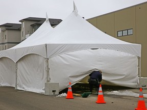 A tent is set up over a scene on March 22, 2018 where homicide detectives are conducting an investigation on 51 Street near 162 Avenue in northeast Edmonton.