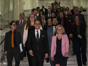 Joe Ceci, President of the Treasury Board and Minister of Finance walks down the steps in the Alberta Legislature with Premier Rachel Notely after delivering Budget 2018 on Thursday, March 22, 2018  in Edmonton. Greg  Southam / Postmedia