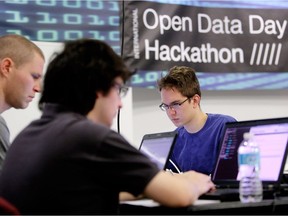 Edmonton participants in the International Open Data Day take part in the Hackathon at the Stanley A. Milner Library, in Edmonton, Alta., on Saturday Feb. 22, 2014. File photo.