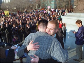 DELWIN VRIEND hugs his companion Andrew Gagnon  during a rally outside the Alberta legislature in April, 1998. A crowd of about 500 had gathered to celebrate the Supreme Court decision which ruled discrimination on the basis of sexual orientation to be unconstitutional.
