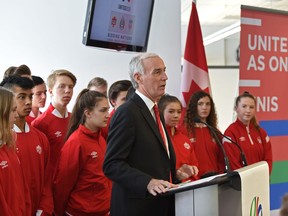 Surrounded by young soccer players, Steven Reed, President of Canada Soccer and Co-Chair of the United 2026 Bid Committee announcing that Edmonton has been named as a host city for the 2026 FIFA World Cup, that would take place in Canada, Mexico and United States, at Commonwealth Stadium in Edmonton, March 16, 2018.