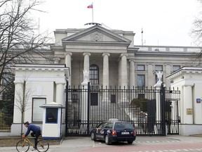 A taxi in front of the Russian Embassy in Warsaw, Poland, Monday, March 26, 2018.Russia's Ambassador to Poland Sergei Andreev was summoned Monday to Poland's Foreign Ministry and said he will stay in Warsaw in the coming weeks, but "we will see" about other embassy employees.