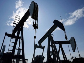 Pumpjacks pump crude oil near Halkirk, Alta., June 20, 2007. Noisy oilpatch equipment is causing songbirds to change their tune, concludes a new research from the University of Manitoba.THE CANADIAN PRESS/Larry MacDougal ORG XMIT: CPT159 ORG XMIT: POS1801251532071866