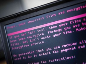 A laptop displays a message after being infected by ransomware as part of a worldwide cyberattack on June 27, 2017 in Geldrop, The Netherlands.