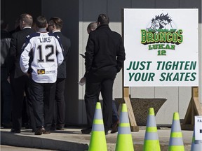 Mourners arrive for the funeral service of Humboldt Broncos' player Conner Jamie Lukan in Slave Lake Wednesday April 18, 2018.