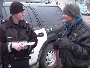 Edmonton police Community Action Team (CAT) will be handing out capes to Edmonton's homeless communities as a part of a new initiative called Project Cape. (Screenshot)