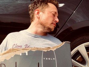 Elon Musk tweeted this photo of himself as an April Fool’s joke with the message: "Elon was found passed out against a Tesla Model 3, surrounded by 'Teslaquilla' bottles, the tracks of dried tears still visible on his cheeks.