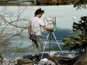 Artist Garrett Plummer captures the natural beauty of Hawrelak Park on Friday April 27, 2018 as temperatures reached 24 C degrees in the sunshine.