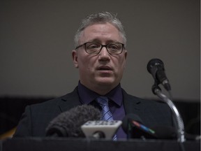 Humboldt Broncos president Kevin Garinger speaks at a news conference on April 8, two days after the team's bus crashed, killing 16.