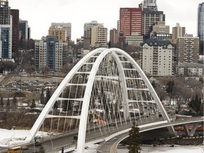 Vehicles cross the new Walterdale Bridge in Edmonton, as seen from the southside of the North Saskatchewan River on Wednesday, March 21, 2018.