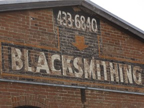 The former Minchau blacksmith shop, first opened in 1925, is seen at 101 Street and 81 Avenue in Edmonton, on Friday, April 6, 2018. Last month, the building's owners applied for a demolition permit.