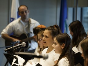 Talmud Torah School students sing during the Holocaust Education Committee of the Jewish Federation of Edmonton's Holocaust Remembrance Day, Yom Ha Shoah, commemorative service at the Federal Building at the Alberta Legislature in Edmonton, on Thursday, April 12, 2018.