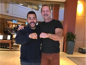 Milson Jonesís son, Devon, left, displays his fatherís 1987 Grey Cup championship Edmonton Eskimos ring alongside Ottawa businessman Walter Pamic, who bought it at an auction in the mid-1990s and has since returned it to the Jones family at no cost. (Supplied photo)