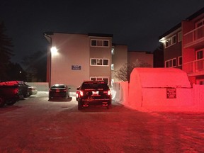 A police presence at a northeast apartment building where Pragalthan Narainsamy Naidoo was found deceased on Dec. 22, 2015.