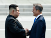 North Korean leader Kim Jong Un, left, shakes hands with South Korean President Moon Jae-in at the border village of Panmunjom in the Demilitarized Zone Friday, April 27, 2018.