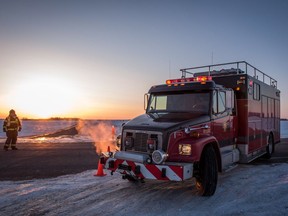 Emergency crews continue to block the highway near where a bus carrying the Humboldt Broncos was struck by a semi north of Tisdale, Sask., Saturday, April 7, 2018.