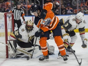 Ty Rattie of the Edmonton Oilers, can't jam the puck past Malcolm Subban of the Las Vegas Golden Knights at Rogers Place in Edmonton on April 5, 2018.