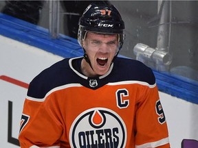 Edmonton Oilers star Connor McDavid celebrates scoring on Los Angeles Kings goalie Jonathan Quick during NHL action at Rogers Place in Edmonton on March 24, 2018.